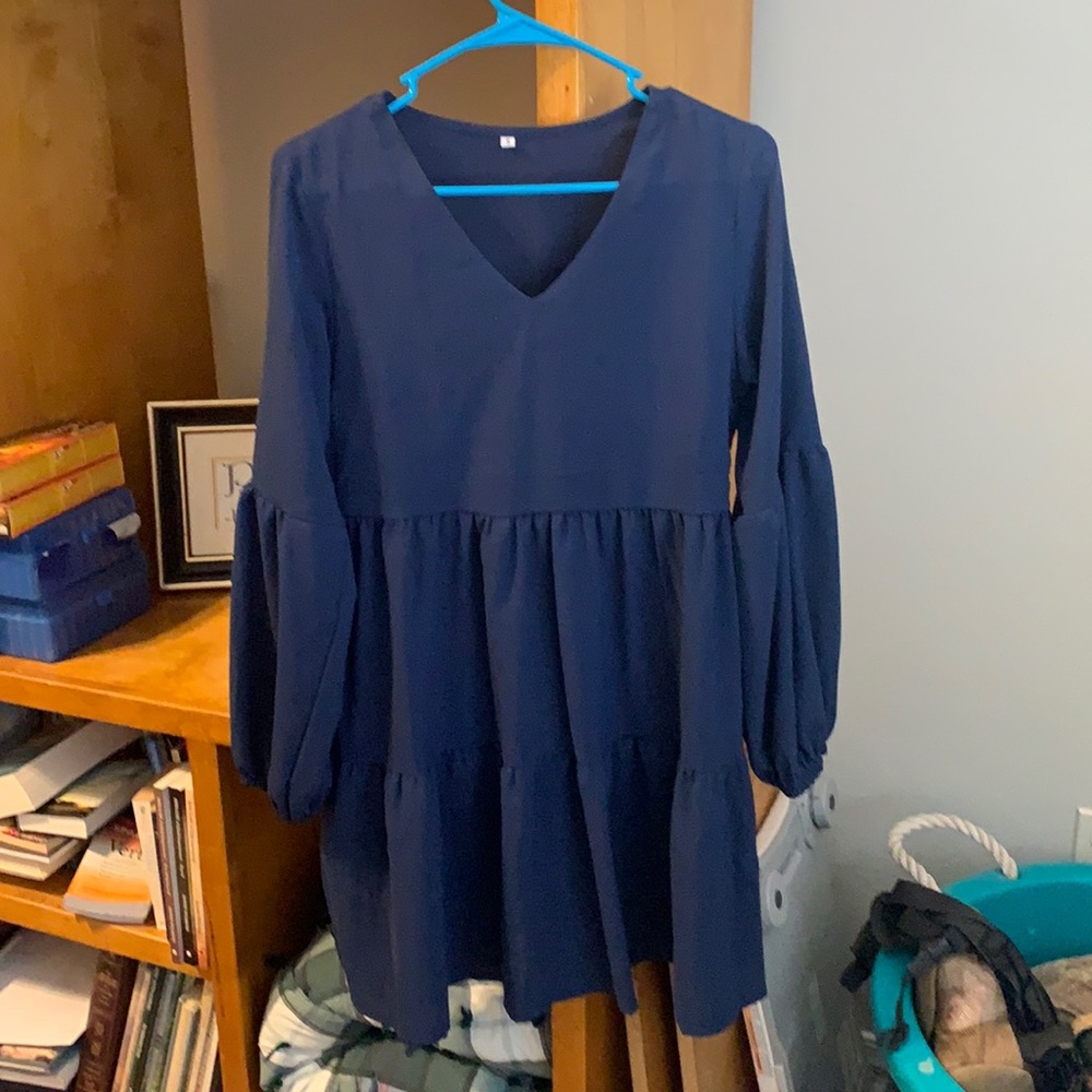 Blue above the knee ruffle dress.